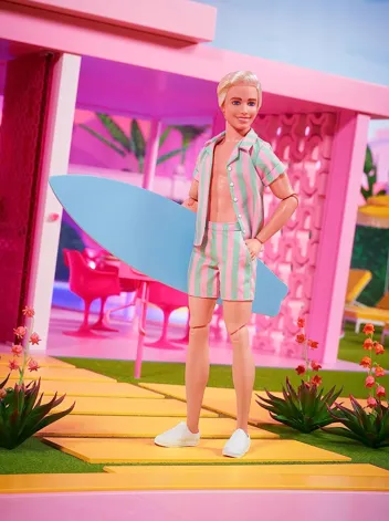 Barbie The Movie Ken Doll Wearing Pastel Pink and Green Striped Beach Matching Set with Surfboard and White Sneakers